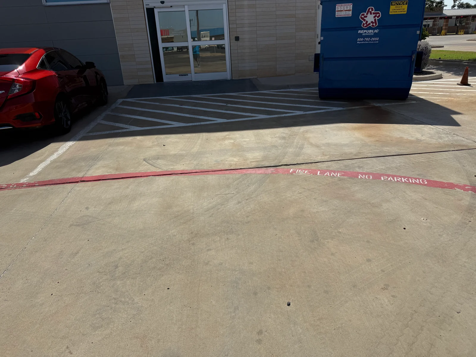 Before · Entrance stalls and fire-lane lettering