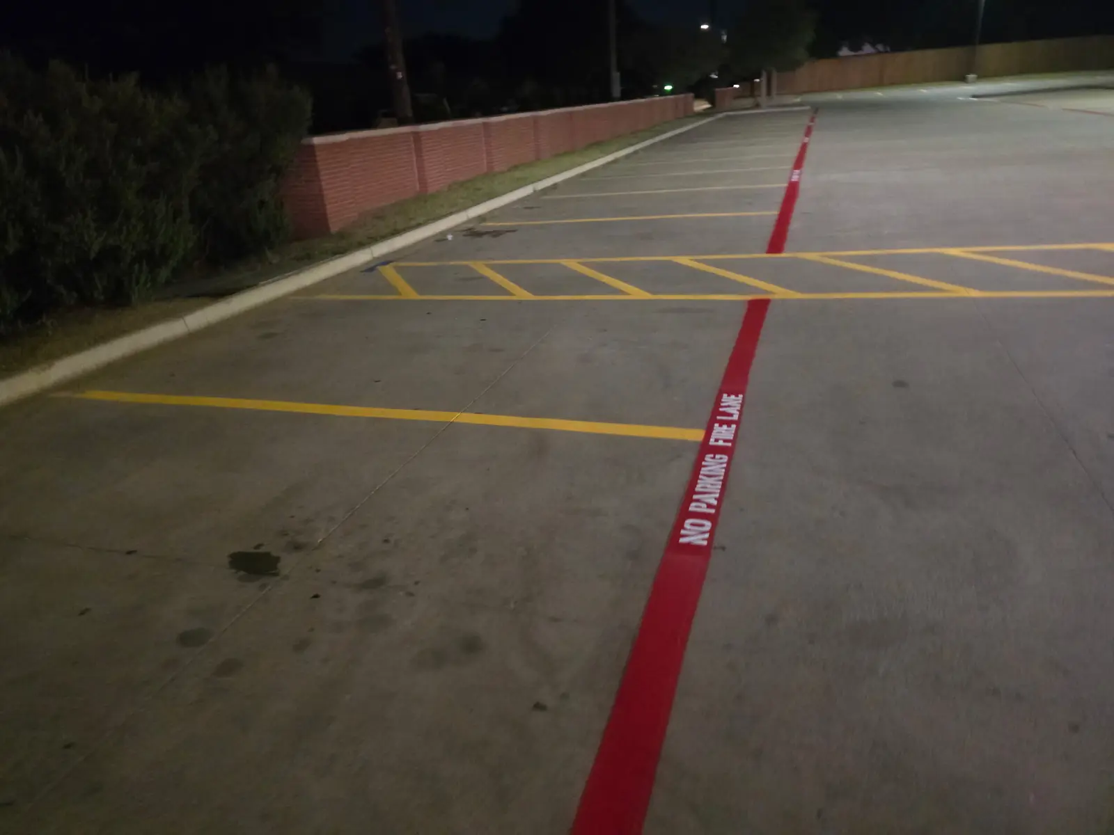 Red fire lane crossing a yellow crosshatch