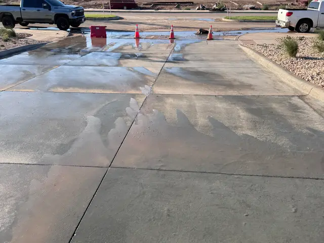 Washing in progress: the clean line across one slab