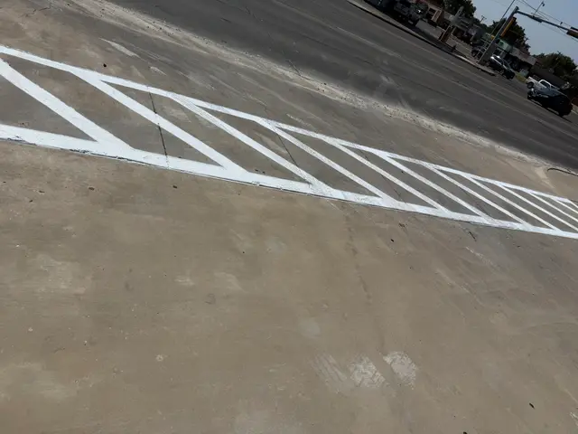 Fresh crosshatch near the street